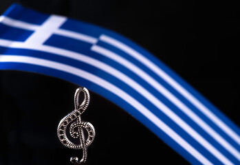 Orthodox Easter. Eurovision. National flag of Greece . Treble clef. Close-up front view.