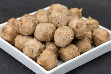 The beef meatballs that were boiled and left out for a long time made the outer skin look...