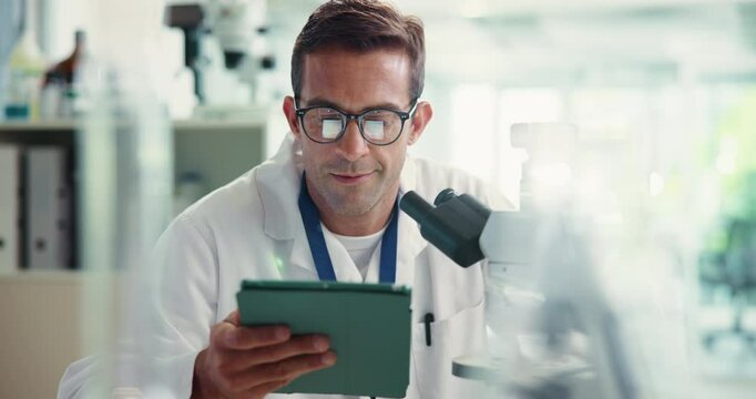 Man, scientist and check microscope with tablet for research, studying bacteria and medical results. Male person, biotechnology and digital for experiment notes, growth feedback and sample of vaccine