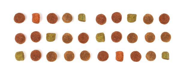 Dry pet food, dog color kibble pile, puppy meat and vegetable pellets, canine protein granules © ange1011