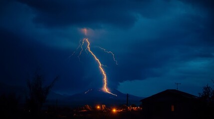 Fototapeta premium An awe-inspiring display of nature unfolds as powerful lightning bolts illuminate the dark sky over an erupting volcano
