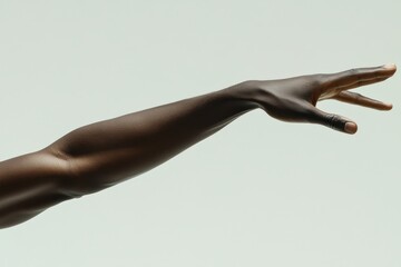 Elegant Outstretched Arm with Smooth Skin Against Soft Background