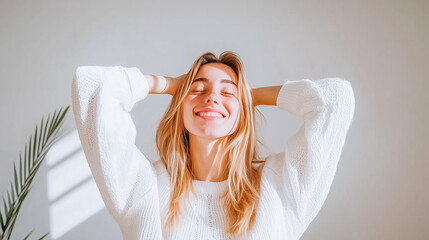 Fototapeta premium Portrait of smiling young multiethnic woman looking at camera with crossed arms. Successful latin business woman standing in modern office with copy space. Young university hispanic girl with smile.