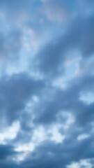 Obraz premium Cloudy evening sky with silver twinkling lights defocused in abstract white background, soft focus, white light