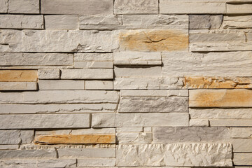 facade stones brown lines wall background of brick horizontal stone grey wallpaper