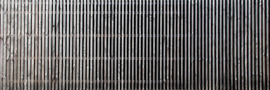 brut brown wooden background with panoramic raw planks boards for header panorama web