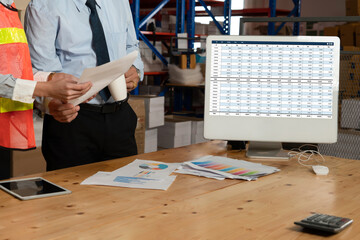 Accounting software on computer screen showing financial statement spreadsheets and account balance...