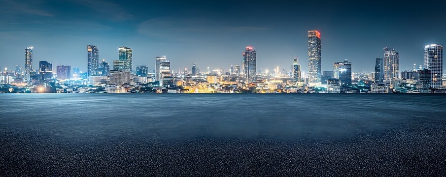 Fototapeta A panoramic nighttime view of a vibrant city skyline in the distance