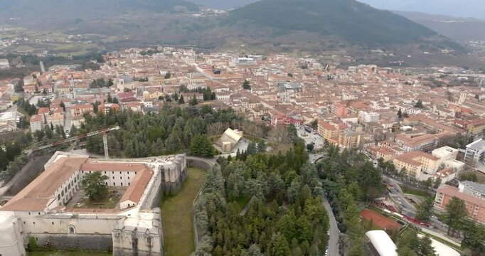 Aerial view of the Spanish Fort of L'Aquila, Abruzzo, central Italy. The Spanish Fort is a medieval and quadrangular castle. In background is the historic center of the city.