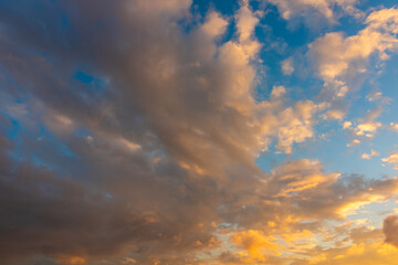 Dramatic orange clouds at sunset. Heaven concept photo