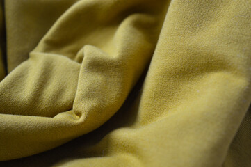 stacked fabric yellow black fashion sustainability material quality textile industry clothing...
