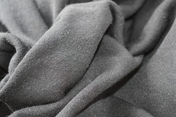 stacked fabric yellow black fashion sustainability material quality textile industry clothing...