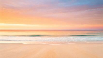 Fototapeta premium a serene beach at sunset with soft hues of orange, pink, and blue reflecting on the calm water 