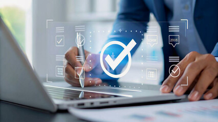 A businessman's hand uses a laptop for digital business communication