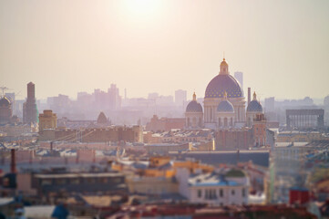 St Petersburg, Russia. Sunrise view of Saint-Petersburg from height - roofs and Holy Trinity Izmailovo Cathedral. Focus at the cathedral. Tilt shift effect and soft filter applied