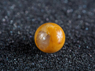 A visually mineral composed primarily of jade, characterized by its vibrant red coloration.