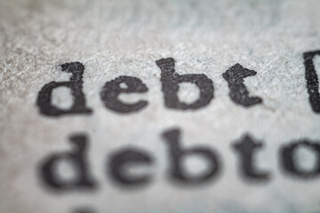 the meaning of the word “debt,” referring to something owed, typically money.