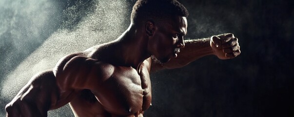 A muscular man throwing a punch with great force and energy