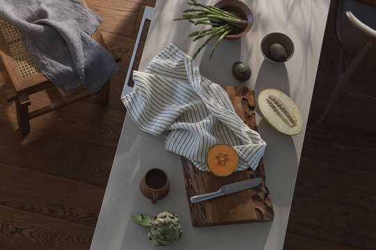 Fresh healthy vegetables and fruits on kitchen counter top view. Healthy lifestyle concept. Kitchen aesthetics concept