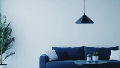 Modern living room interior with a navy blue sofa, minimalist style,  empty wall,  and a pendant light.