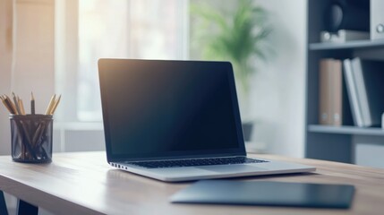Modern workstation with a sleek laptop and a video conference background.