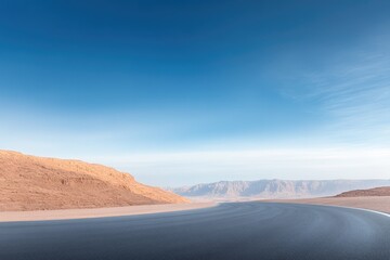 Naklejka premium scenic road winds through vast desert landscapes under clear blue skies traveler explores limitless horizons