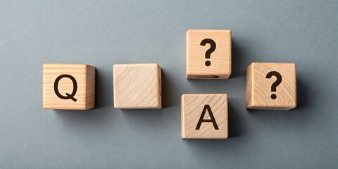 QandA Blocks on Gray Questions and Answers Concept with Wooden Cubes, FAQ, Help