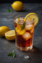 Refreshing iced tea with lemon slices and mint leaves