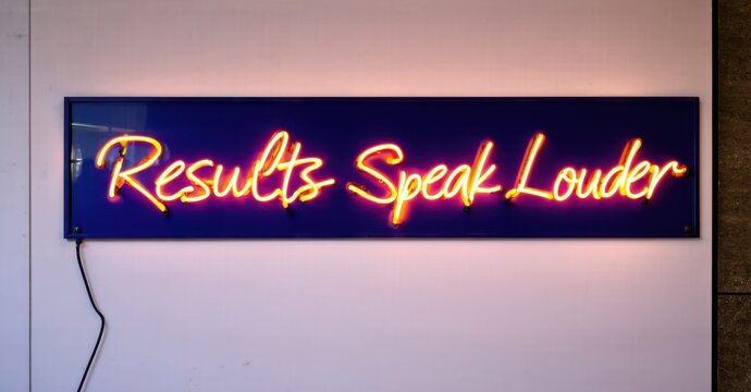 Neon sign results speak louder orange deep navy mounted inside modern financial district softly glowing elite banking towers