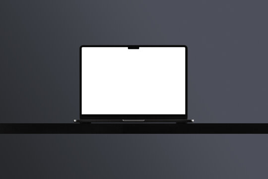 The laptop is placed on a dark, floating surface, against a monochrome, gradient background. Isolated blank mockup surface to place your design. 
