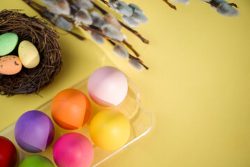 happy easter, eggs in the nest and willow, easter background