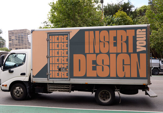 Delivery Truck Parked Along City Street in Sydney During Bright Daylight Hours