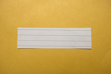 Ripped paper, space for copy. Yellow background.	