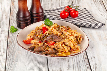 Asian udon noodles with beef