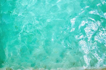 Clear Blue Water Surface of Swimming Pool on a Sunny Day in Tropical Paradise Settings
