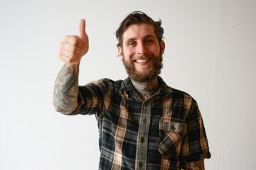 Portrait of a blissful man in his 30s showing a thumb up on white background