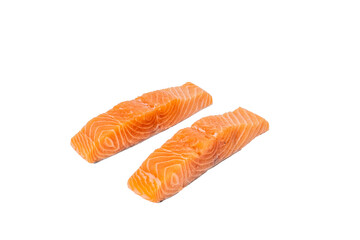 Two pieces of salmon are on a white background. The salmon is cut in half