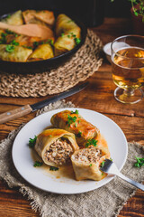 Two Cabbage Rolls Stuffed with Minced Meat and Rice on White Plate Served with Chopped Parsley