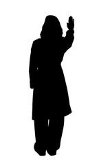 silhouette back view of a woman standing with arm raised showing stop sign