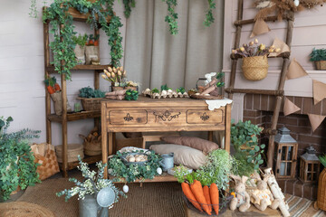 Cozy home garden in boho style. Workshop. Rustic interior design room with wooden table, flowers, green plants and gardening tools. Urban jungle at eco home. Easter spring decor at home. Greenhouse	
