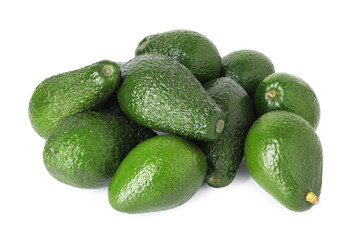 Pile of whole ripe avocados isolated on white