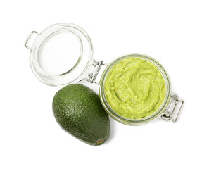 Tasty avocado dip in glass jar and fruit isolated on white, top view