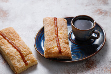 Homemade nut shaped russian soviet cookies and wafer rolls with pastry cream.
