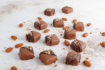 Handmade chocolate with pistachios, dark and milk chocolate pieces.