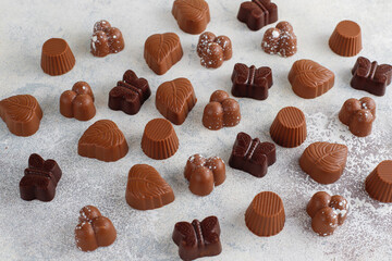 Handmade chocolate with pistachios, dark and milk chocolate pieces.