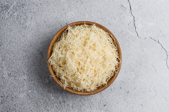 Homemade uncooked kataifi or kadaifi dough.