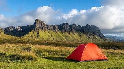 Red tent in Icelandic mountain meadow