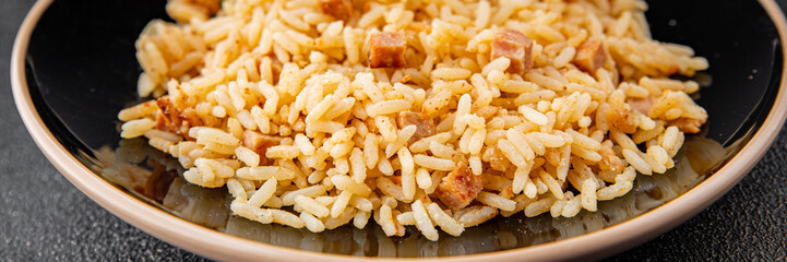 Rice with ham meat main course delicious fresh delicious gourmet food background on the table rustic food top view copy space