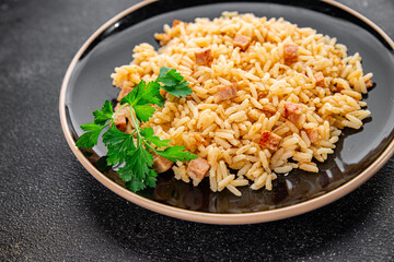 Rice with ham meat main course delicious fresh delicious gourmet food background on the table rustic food top view copy space