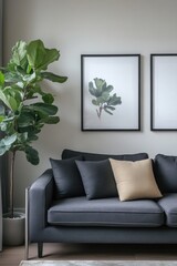 Modern living room with potted plant and framed artwork